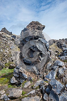 Volcanic glass rock known as obsidian found in lava fields formed by polymerized magma during volcanic eruption in rhyolitic