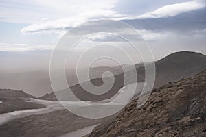 Volcanic landscape during ash storm on the Fimmvorduhals hiking trail. Iceland