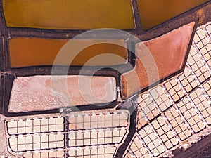 Volcanic landscape with lighthouse and salt production facility. La Palma island, aerial view