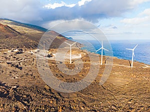 Volcanic landscape with lighthouse and salt production facility. La Palma island, aerial view