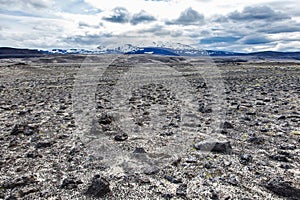 Volcanic landscape - stone and ash wasteland photo