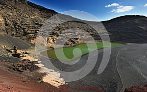 Volcanic landscapes of Lanzarote El Golfo lake