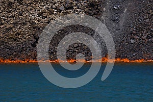 Volcanic lava burning in sea