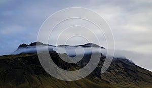 Volcanic mountain with a cloud in ICELAND