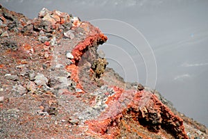 Volcanic red lava rocks in crater