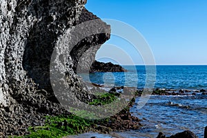 Volcanic Rock Arch at Seashore in Cabo de Gata, Spain photo