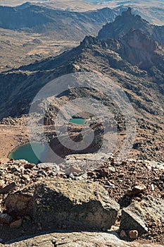 Volcanic rock formations above the clouds, Mount Kenya