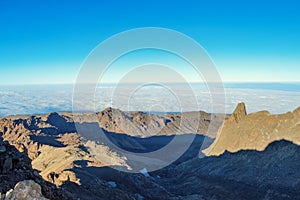 Volcanic rock formations in the panoramic mountain ranges in Mount Kenya