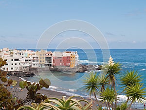 Volcanic sand beach and harbour of Tenerife
