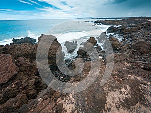 Volcanic shoreline of La Perouse Bay