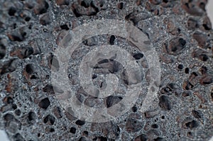 Volcanic stone, hardened porous lava. Close-up photo of stone