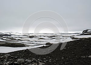 Volcanic white&black landscape of Fimmvorduhals between Eyjafjallajokull and Myrdalsjokull Fimmvorduhals Trek from Skogar to