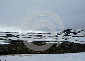 Volcanic white&black landscape of Fimmvorduhals between Eyjafjallajokull and Myrdalsjokull Fimmvorduhals Trek from Skogar to