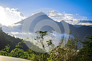 Volcano with beautiful sunset and sun shining,