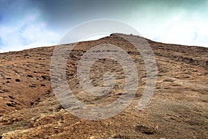 volcano caldera with background clouds photo