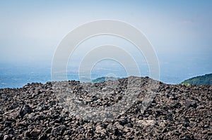 Volcano Etna view with lava stones