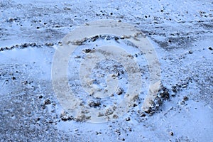 snow on a dirt road photo