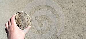 Volcano Stones in Hand, Volcanic Pumice with Glass, Pieces of Lava, Basalt Extrusive Igneous Rock photo