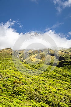 volcano Taranaki covered in clouds, New Zealand