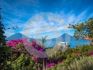 Volcano View with Boat, flowers and sky