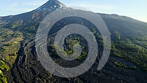 Volcanoes with lava flows on land northern edge