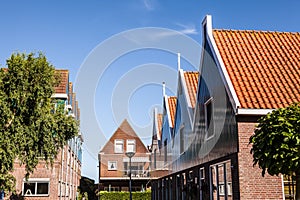 VOLENDAM, NETHERLANDS - JUNE 18, 2014: Traditional houses & streets in Holland town Volendam, Netherlands.