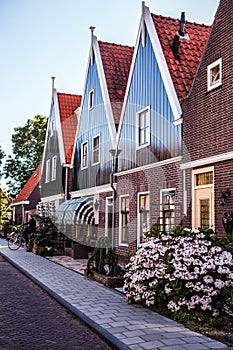 VOLENDAM, NETHERLANDS - JUNE 18, 2014: Traditional houses & streets in Holland town Volendam, Netherlands.