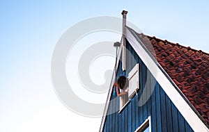 VOLENDAM, NETHERLANDS - JUNE 18, 2014: Traditional houses & streets in Holland town Volendam, Netherlands.