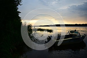 Volga river. On the banks of the river villages and forests. Sky clouds. Steep and precipitous banks, covered with trees that look