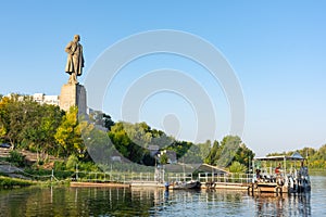 Volgograd, Russia - August 21, 2019: View at dawn on the embankment and the statue of V.I. Lenin in the Krasnoarmeysky district of