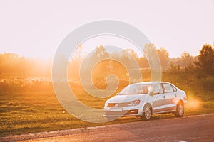 Volkswagen Polo Car Parking On A Roadside Of Country Road During