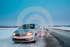 Volkswagen Polo Car Sedan Parking On A Roadside Of Country Road