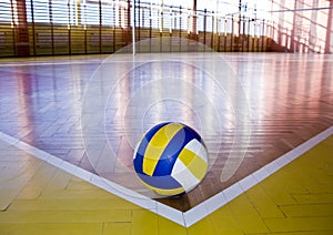 Volleyball in school gym indoor. photo