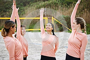 Volleyball, hands up or sports women at beach playing a game in training or fitness workout together. Team spirit, happy