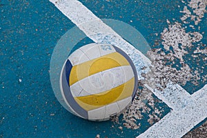 Volleyball in school gym indoor.