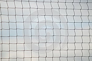 Volleyball summer sport. Net on a sandy beach