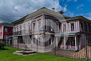 Old wooden house with carved windows in Gogol Street, 51, Vologda city Russia