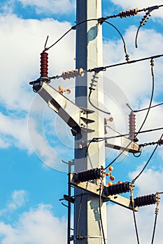 Voltage Power Lines at a metal Utility pole