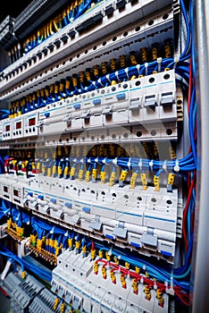 Voltage switchboard with circuit breakers. Electrical background.