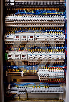 Voltage switchboard with circuit breakers. Electrical background.