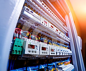 Voltage switchboard with circuit breakers. Electrical background.