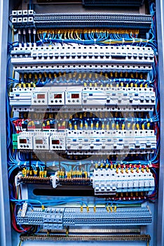 Voltage switchboard with circuit breakers. Electrical background.