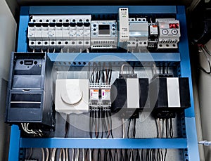 Voltage switchboard with circuit breakers. Modern electrical background.