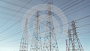 voltage transmission on electric tower. high-voltage. powerful substation