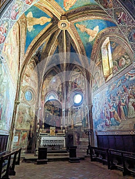 VOLTERRA, ITALY - SEPTEMBER 20, 2023 - Romanesque frescos in the Cappella della Croce di Giorno in Volterra