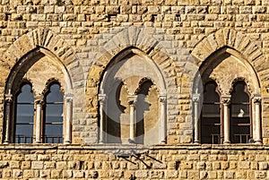 Volterra (Pisa) - Three mullioned windows photo