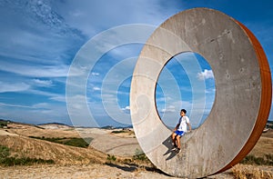 Volterra, Tuscany, Italy. August 2020. In the countryside of the city, a modern art installation draws attention to the Tuscan