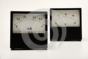 Voltmeter and ammeter on a white background. A means of measuring electric current and voltage