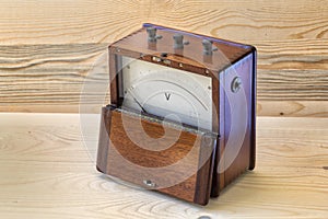 Voltmeter vintage with wooden cover photo