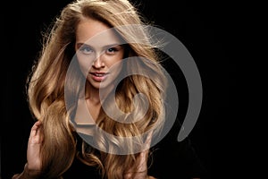 Volume Hair. Beautiful Woman Model With Long Blonde Hair